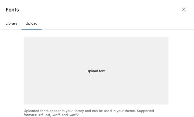 In the 'Upload' menu tab, upload custom fonts by selecting the 'Upload font' window