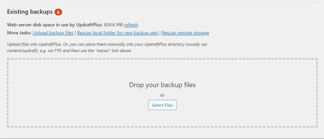 In the 'Existing backups' section select 'Upload backup files' button or drag and drop files from your computer to upload them
