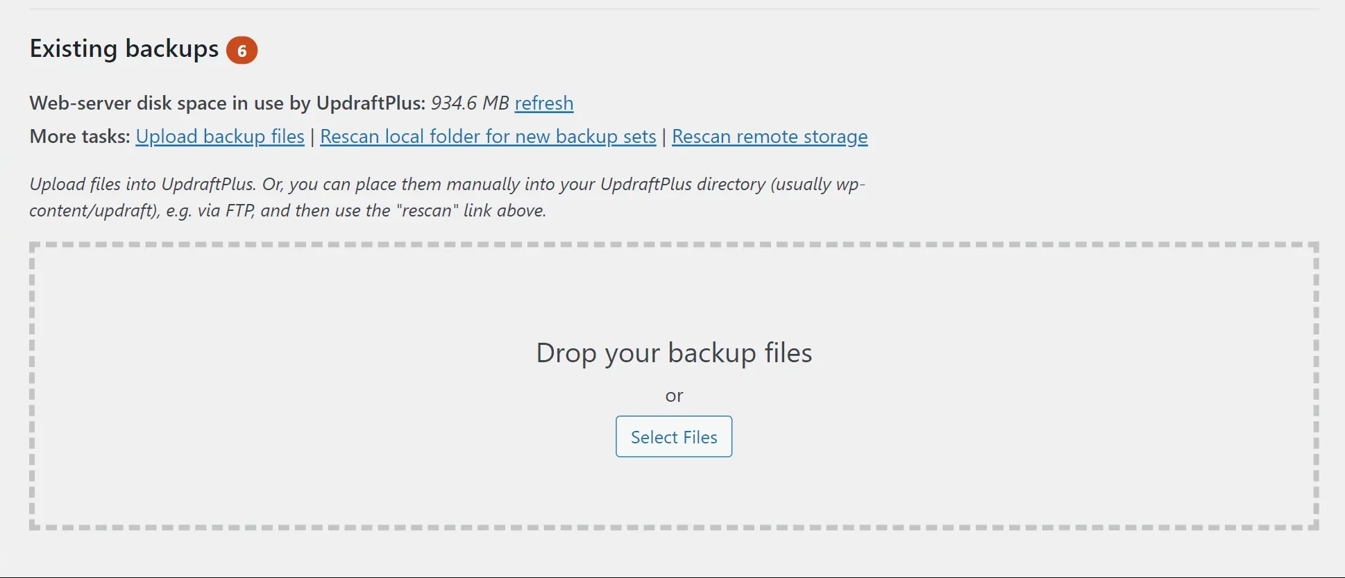In the 'Existing backups' section select 'Upload backup files' button or drag and drop files from your computer to upload them
