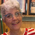 Photo of reviewer, Older lady with grey hair, red and white stripey t-shirt.